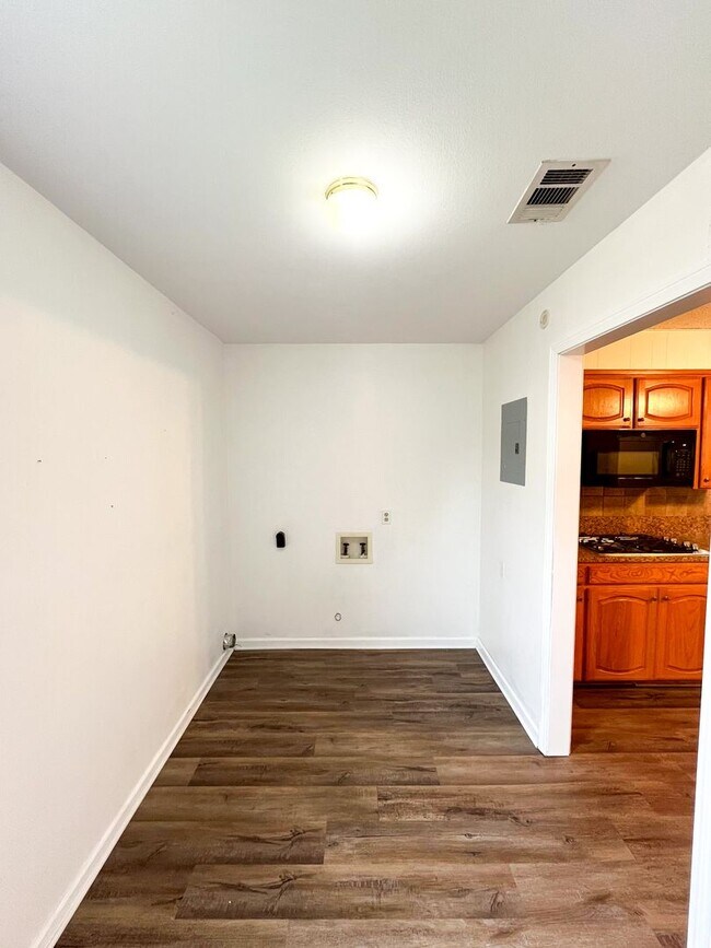 Building Photo - Available Now!!!! Gorgeous 3 bedroom, 2 bath, 2 car garage home. Beautiful wood look flooring. Sp...