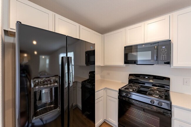 Building Photo - Your Ultimate Modern Haven: Comfort, Style, & Convenience Await in this Meticulously Designed Ret...