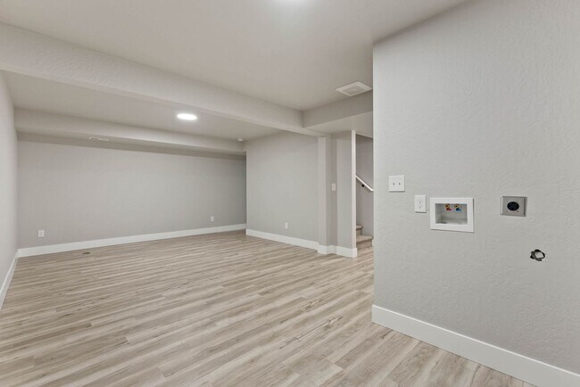 Building Photo - Newly built 4 Bedroom Duplex With Garage