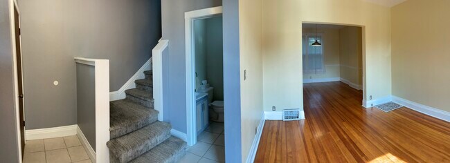 Front entry, half bath, living/dining - 915 S 33rd St