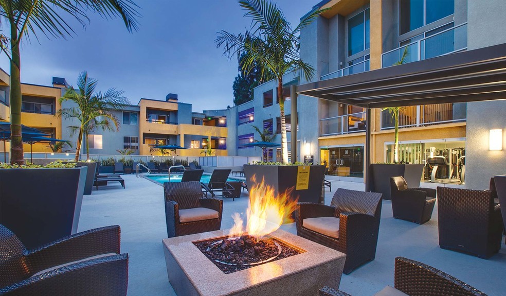 Lounge by the outdoor fireplace - Crescent at West Hollywood