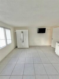 Building Photo - 3390 W 12th Ave