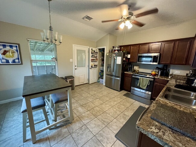 Building Photo - 3-bed 2-bath 2-car garage with screened in porch & backyard shed in Riverside Grove cul-de-sac.