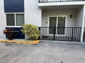Building Photo - 8009 W 6th Ave