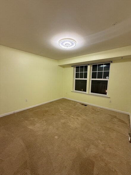 3nd bedroom includes a ceiling fan - 2719 Pinebrook Rd