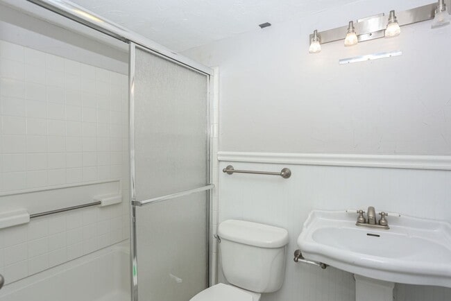 Building Photo - Walk to everything! Partially Furnished! Flexible lease terms!