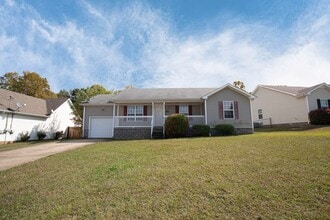Building Photo - Pet Friendly with Fenced Yard!