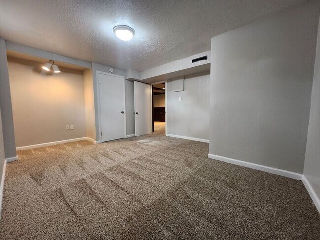 Building Photo - Move-In Ready 5-Bedroom Gem – Enjoy 50% Of...