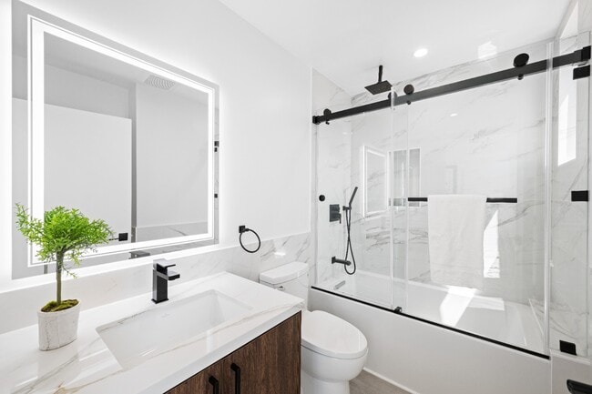 Building Photo - Stunning brand-new 3 Bedroom 4 Bathroom townhouse with private garage and rooftop balcony!