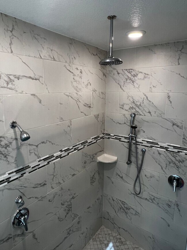 Building Photo - FOUR BEDROOMS and THREE BATHS For Rent