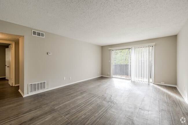 2BR, 1.5BA - 1,125SF - Living Room - Royal Manor Apartments