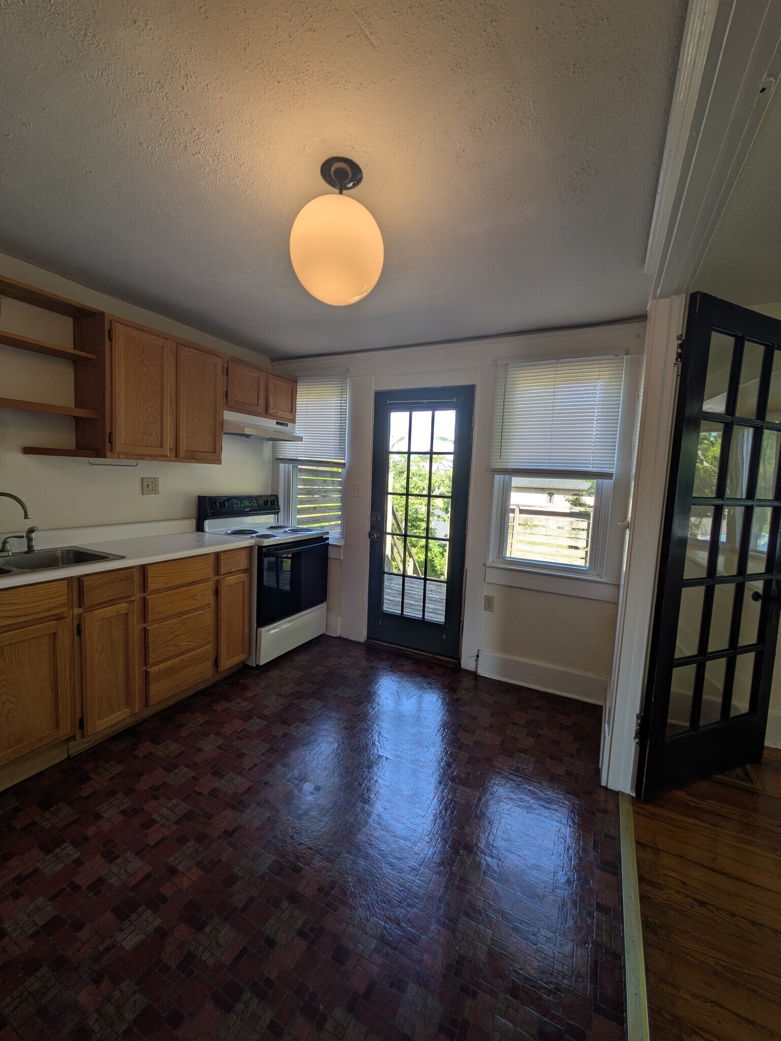 Kitchen towards entry - 1703 S Preston St