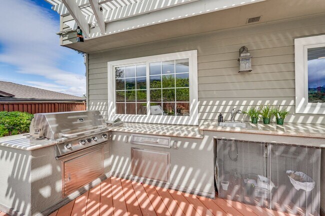 Building Photo - Remodeled 5 Bedroom Home with Heated Pool, Hillside Views, Solar, and Sunrise and Sunset Views in...