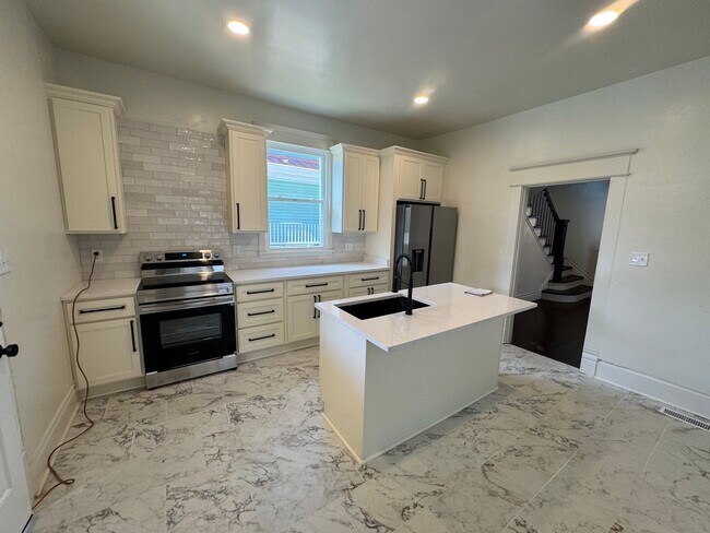 Building Photo - Updated 3-Bedroom, 2-Bath with all new appliances.