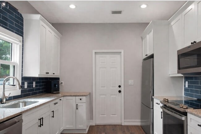 Building Photo - 1213 E 12th Ave