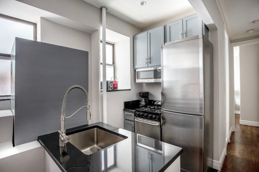 Building Photo - SOHO 1 bedroom with Custom Gourmet Kitchen