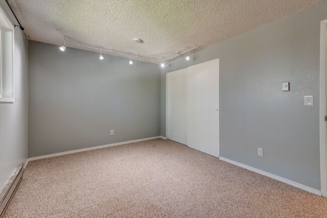 Building Photo - Spacious 4-Bedroom Home with Fireplace, Fenced Yard, and 2-Car Garage