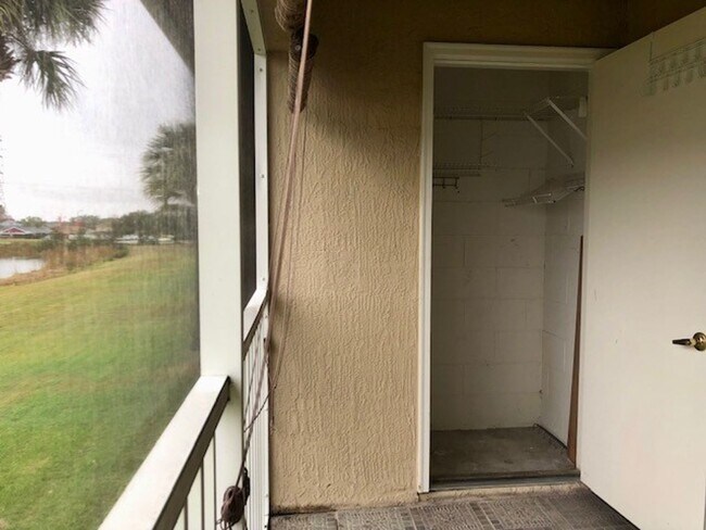 Building Photo - Nice 2X2 located on 2nd floor- Tile & lami...