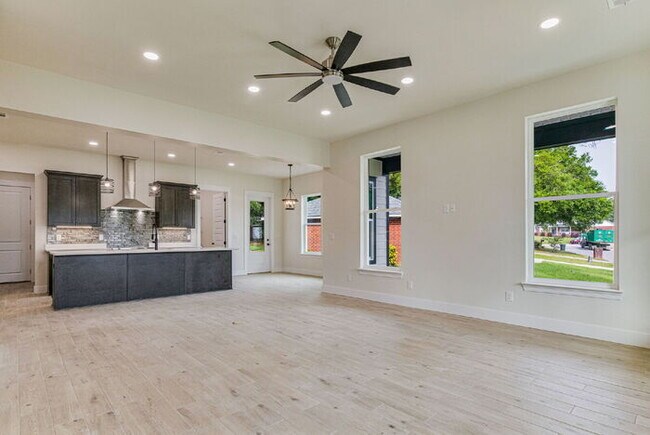 Building Photo - This luxurious new custom home in the sought-after Shadow Grove subdivision is a masterpiece of m...