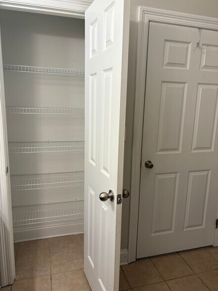 Primary Linen Closet - 3218 Veterans Memorial Pky
