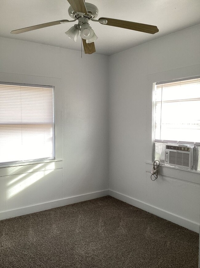 Building Photo - Freshly painted rooms in cute 2 bedroom home on quiet street!  Pets welcome!