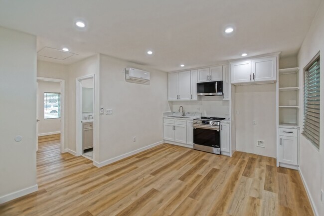Building Photo - NEWLY BUILT, LUXURIOUS & BRIGHT, 1BR1BA AD...