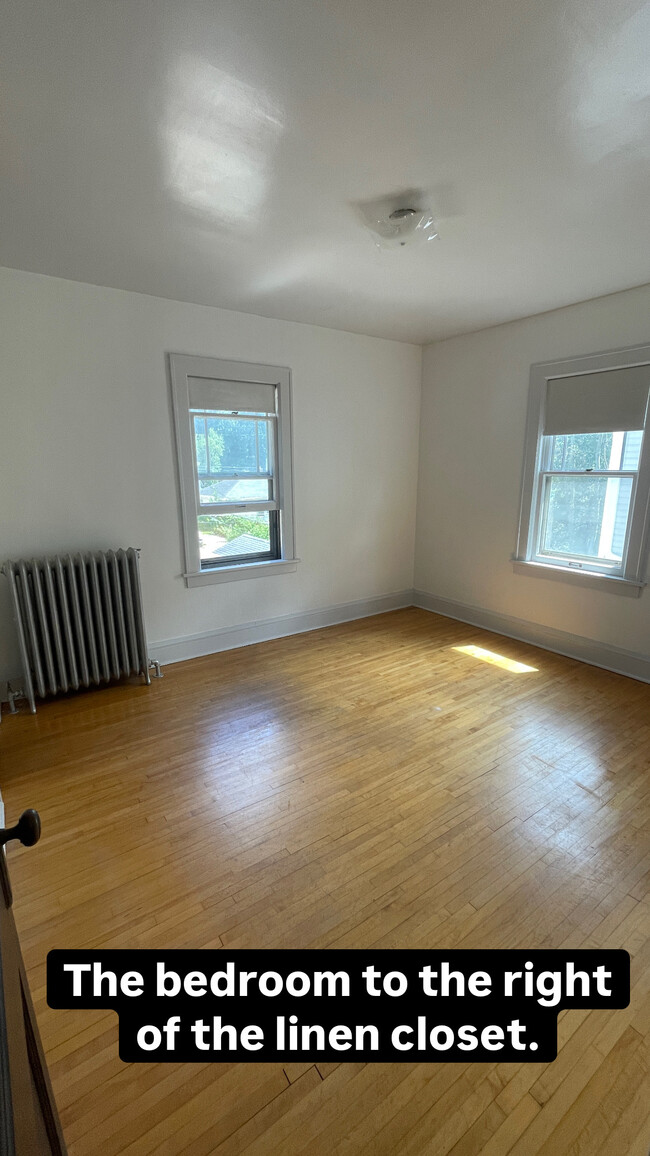 Bedroom #2. Standing in the hallway, the bathroom is to the right, linen closet to the left. - 4235 Pleasant Ave