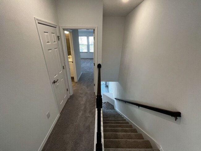 Building Photo - Townhome with garage, excellent location, community pool and more