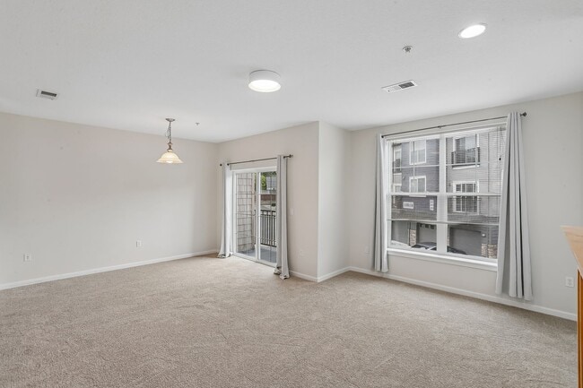 Building Photo - Dual-Suite 2BR/2.5BA Townhome-Style Condo — Gas Fireplace, Balcony & Attached Garage | Heron Cree...