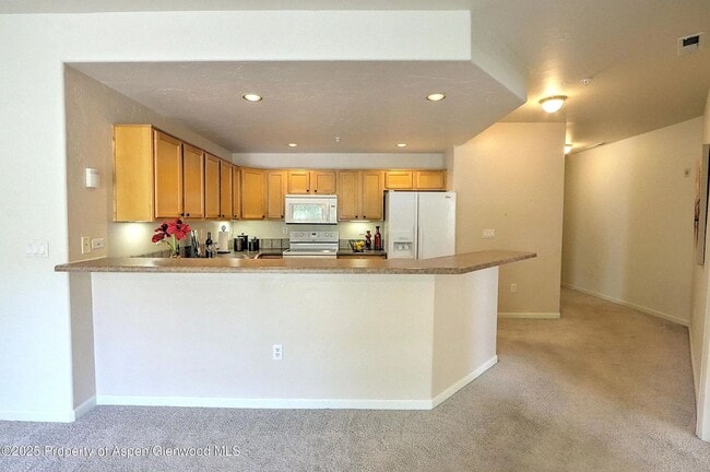 Building Photo - Spacious 3-Bedroom Condo with Scenic Views