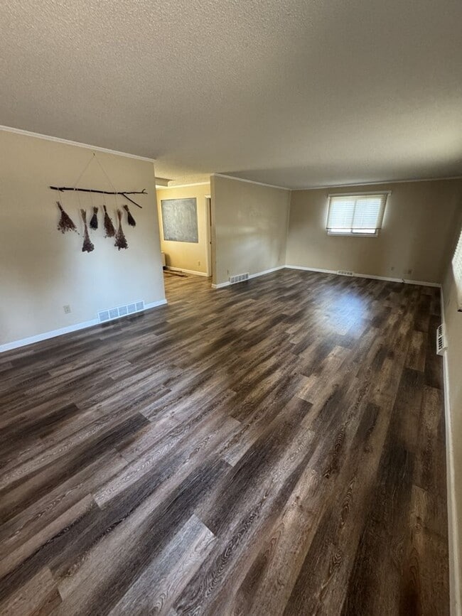 Building Photo - STUDENTS WELCOME! 5-Bedroom / 3-Bathroom Tri-Level Home Two Miles from CSU