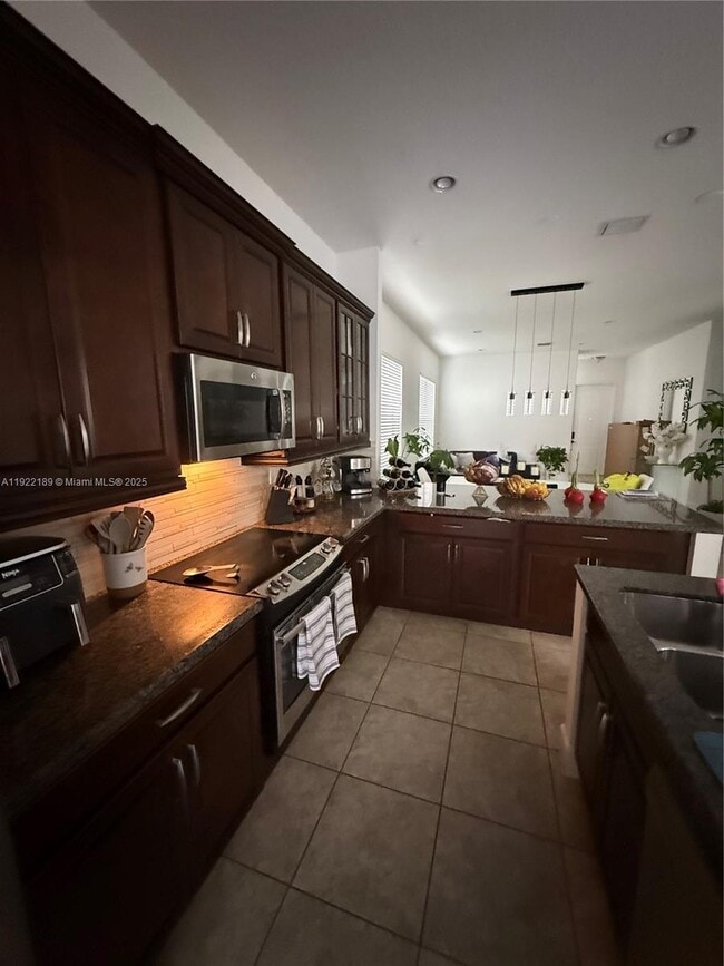 Building Photo - 9823 W 34th Ln