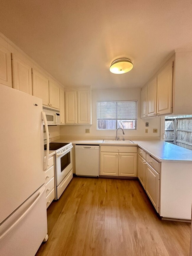Building Photo - Unit with updated flooring!