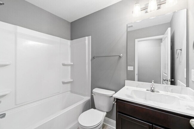 Building Photo - Pet Friendly Three Bedroom with Bonus!