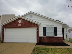 Building Photo - 9211 Wandflower Dr