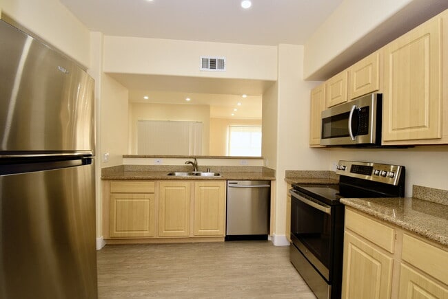 Building Photo - Upgraded & Charming Two-Bedroom Condo with Prime Location At Coronado Palms!