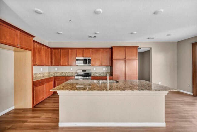 Building Photo - Sun-Filled, Spacious Living with a Three-Car Garage