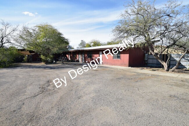 Building Photo - Charming Mid-Century Style: Vaulted Beams & Private Oversized Yard