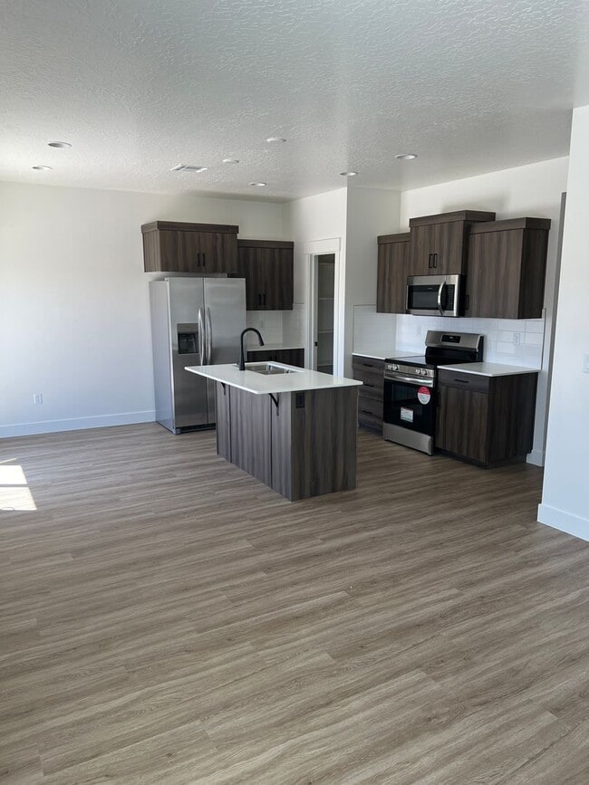 Building Photo - BRAND NEW 4 bedroom townhome in South Dese...