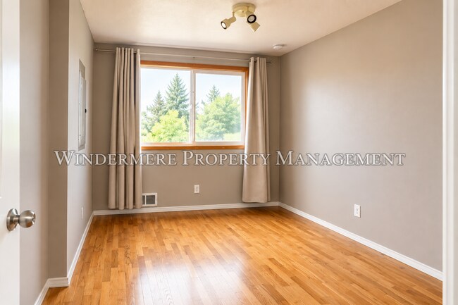 Building Photo - Three Bed Rambler on large fenced corner lot with patio