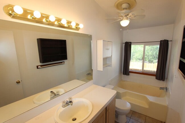 Building Photo - Bright 3-Bedroom Home with Fenced Yard + Detached 2-Car Garage