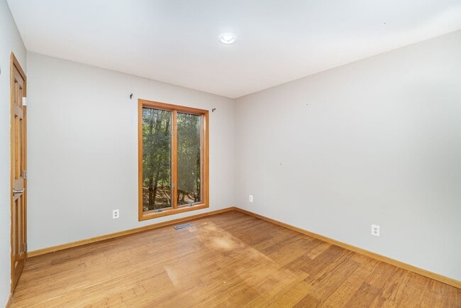 Building Photo - Stunning 4-Bedroom Home with 5 Full Baths + Hot Tub, Wooded Retreat