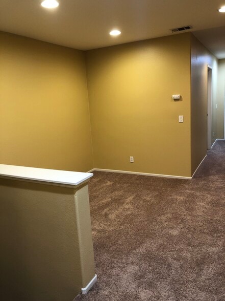 Upstairs loft for office set up ,upstairs off of hallway . - 6395 Delgado Ln