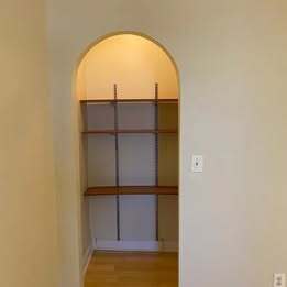 alcove with shelves - 1242 Queen St NE