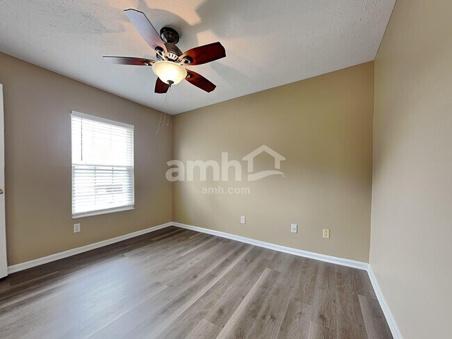 Building Photo - 9865 Whispering Pine Dr