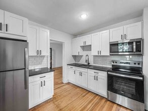 Building Photo - AVAILABLE OCT 1ST! CHECK OUT THIS FULLY RE...
