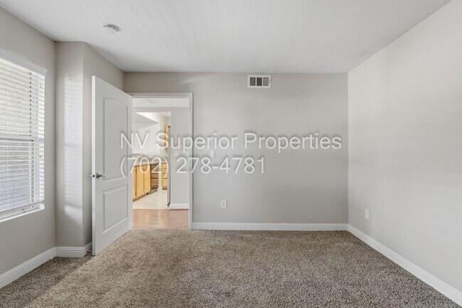 Building Photo - SW!! First floor unit with Balcony!! Gated!! Clubhouse!!  Community pool!! Spa!! Exercise Room!! ...