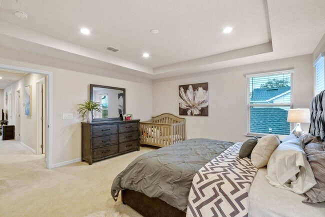 Building Photo - Water Front Home- 4 Large Bedrooms-3 baths Gated Community Call Sheila Campbell 407-687-7900