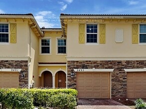 Building Photo - 9495 SW Merlin Ct