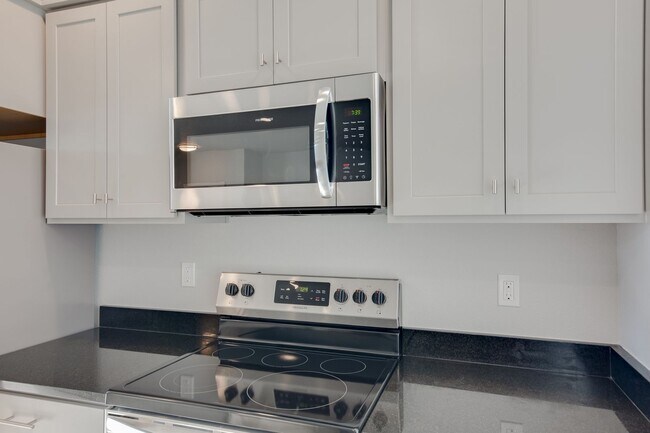 Building Photo - Baraya Townhomes: Modern Townhomes for Ren...